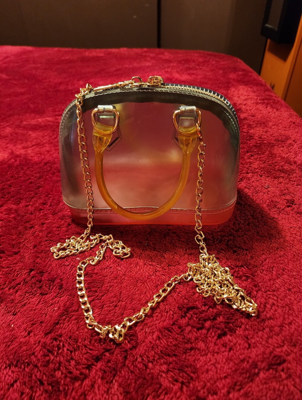 Translucent mini crossbodybage 7x5x3 1/2 . removable gold chain strap.